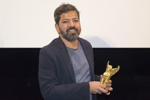 Director Bardroy Barretto receiving the Grand Prix for "Let's Dance to the Rhythm"